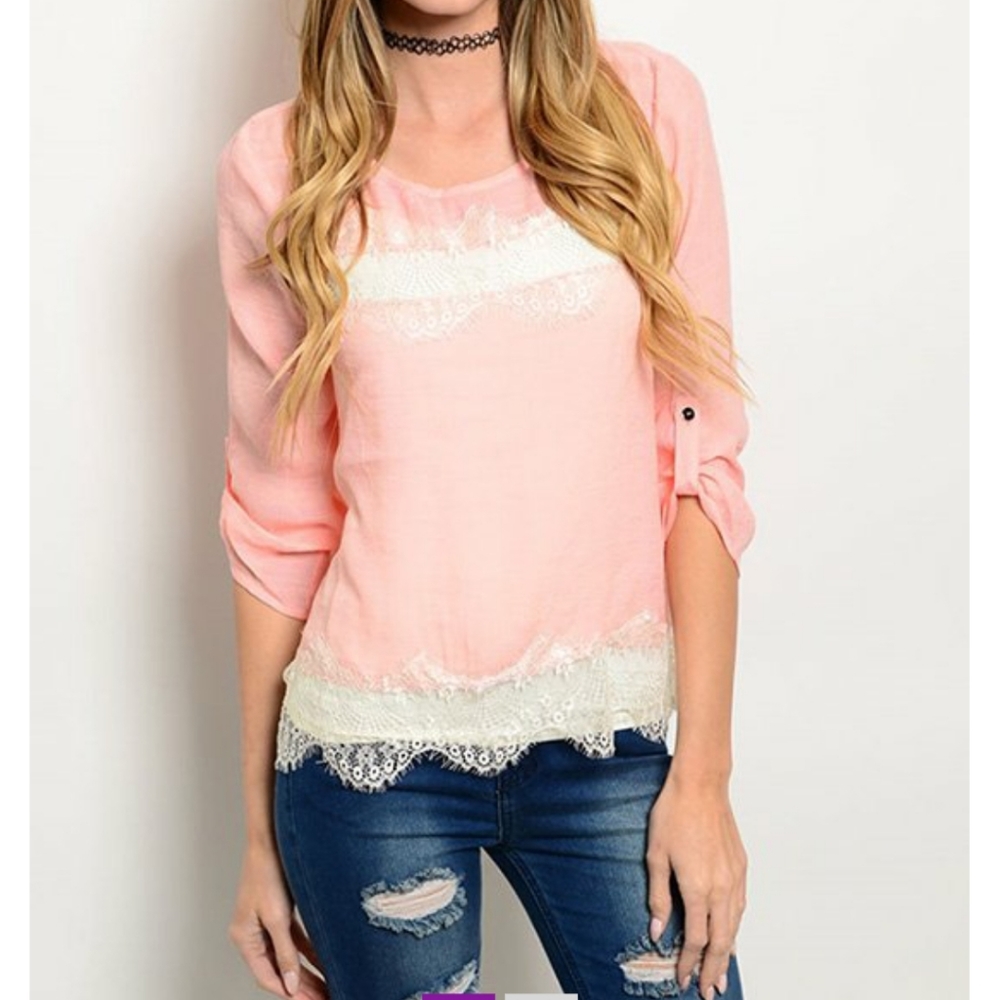 Pink long sleeve top with sheer lace panels